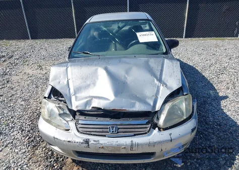 1999 Honda Civic Lx from USA, damaged, VIN 1HGEJ6679XL051131